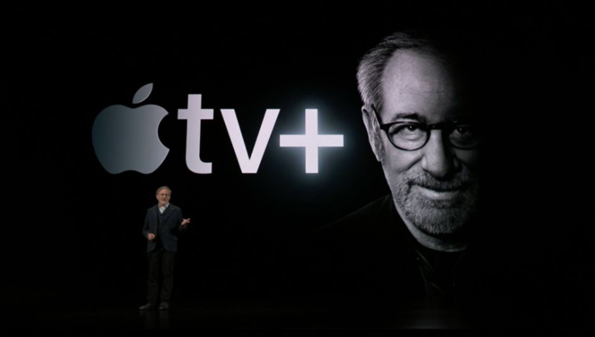Apple TV Plus interface showing featured originals and a price tag overlay