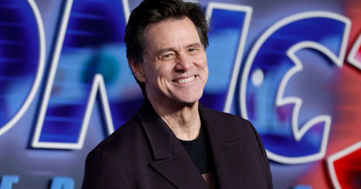 Jim Carrey smiling at a public event in 2025