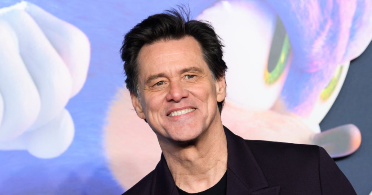 Jim Carrey smiling at a public event in 2025