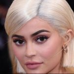 Kylie Jenner posing in a high-fashion outfit during her 28th birthday celebrations
