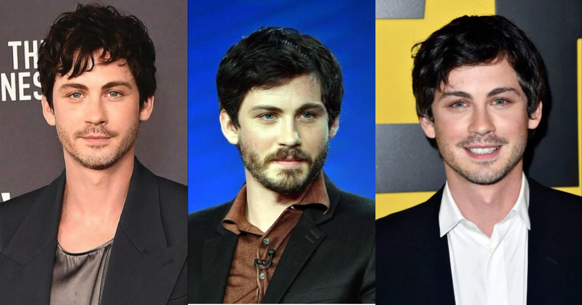 Logan Lerman posing at a movie premiere in formal attire with a calm, confident expression
