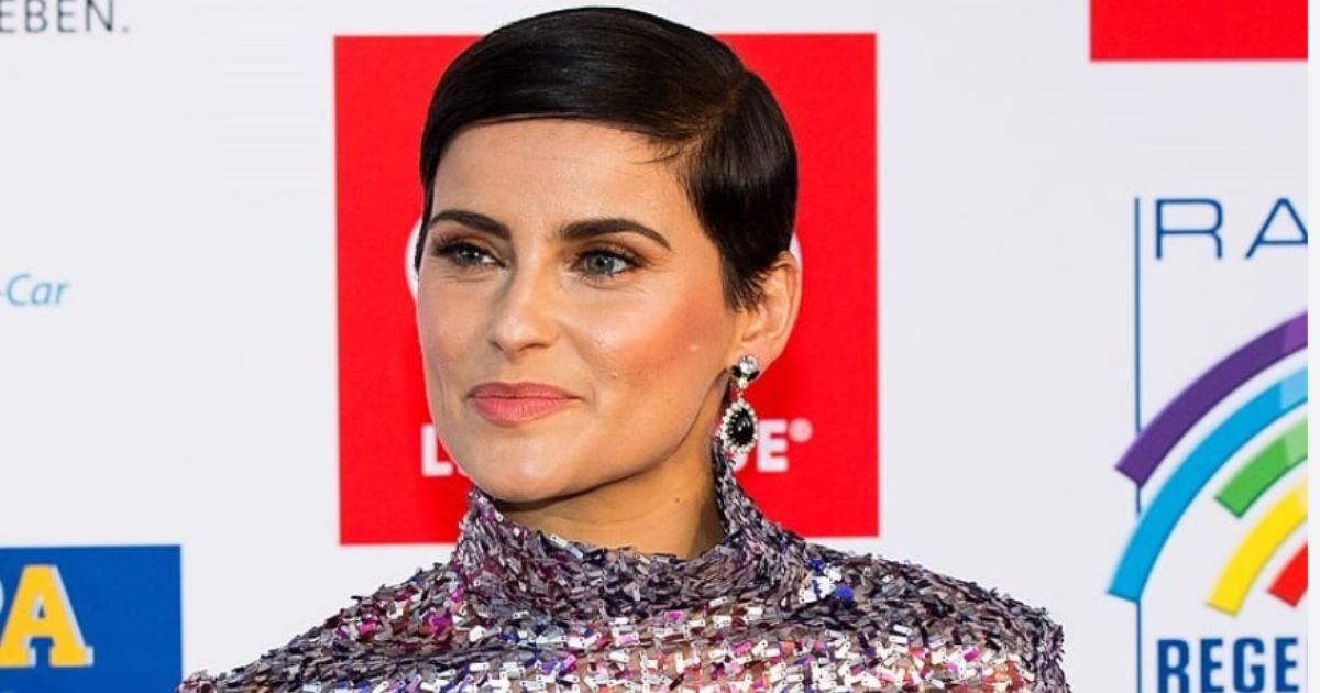 Nelly Furtado performing at a 2025 summer music festival