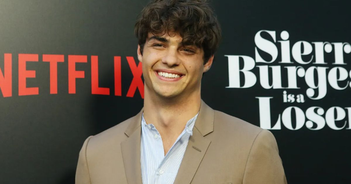 Noah Centineo arriving on the red carpet at the 2025 SAG Awards in a tuxedo