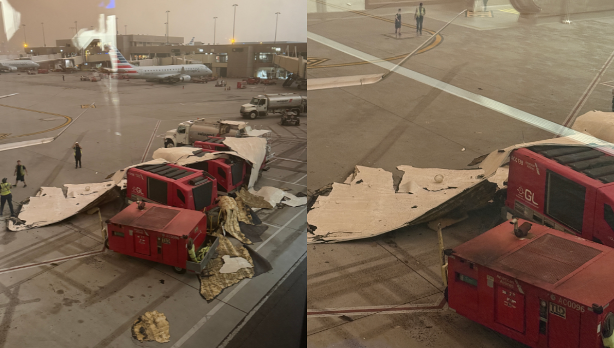 Towering wall of dust rolling over Phoenix Sky Harbor as aircraft and terminals disappear into brown haze
