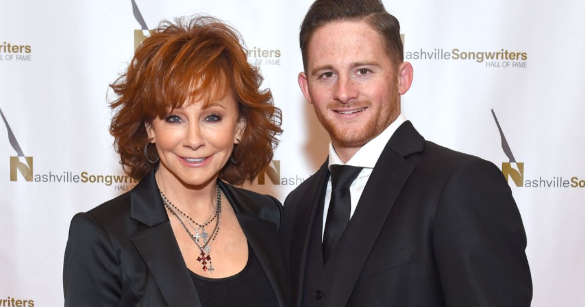 Reba McEntire with son Shelby Blackstock celebrating his first solo flight