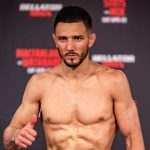 Aaron Pico throwing a wrestling-style punch in an MMA gym, 2025