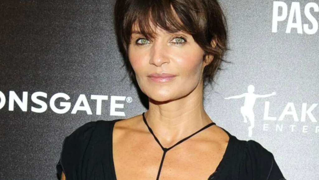 Helena Christensen in a studio with camera gear and perfume vials