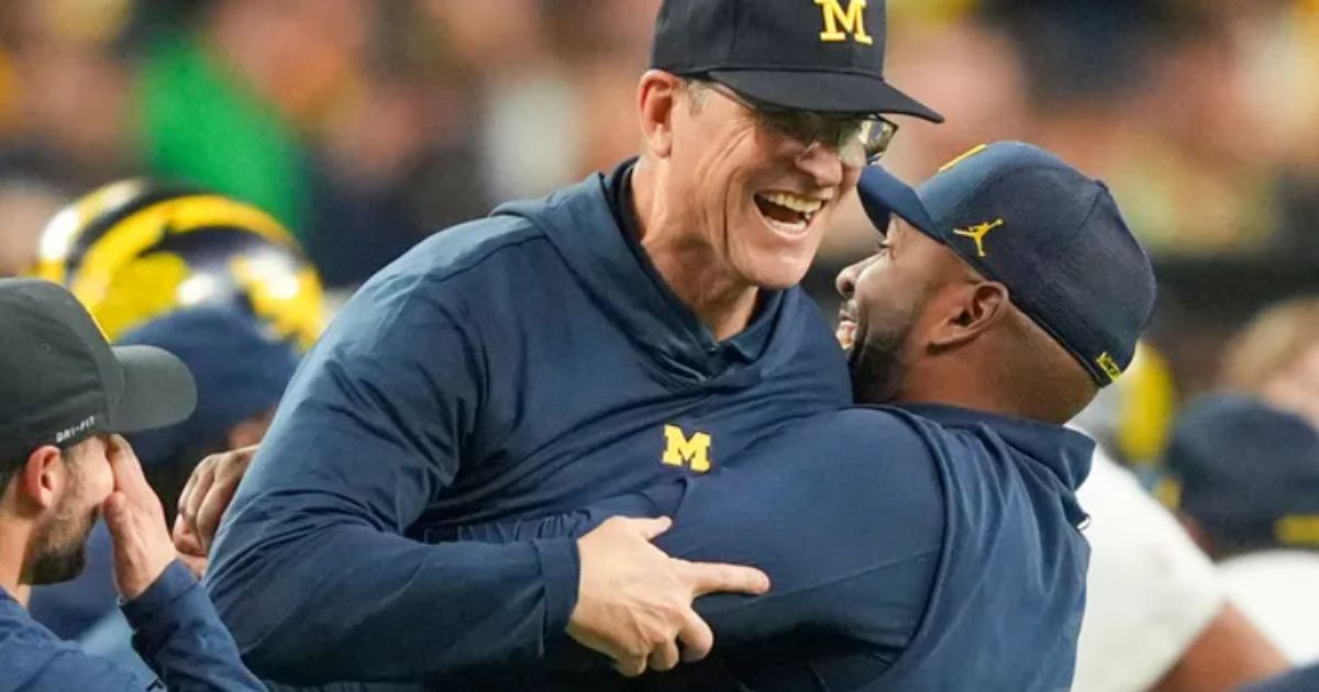 University of Michigan Wolverines football baring the NCAA logo with a gavel and penalty icons in the background