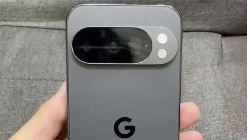 Pixel 10 family on a table next to the Made by Google stage backdrop