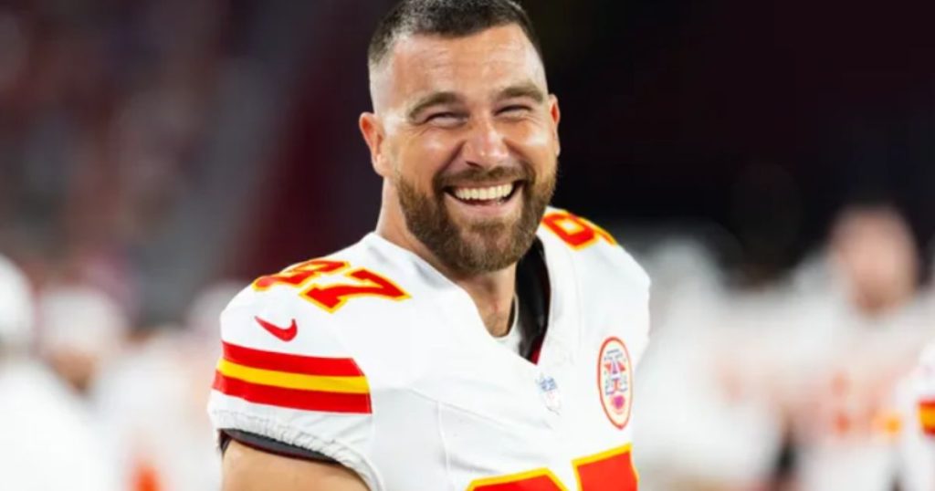 Travis Kelce posing in a fur-lined hood for his GQ cover shoot, September 2025