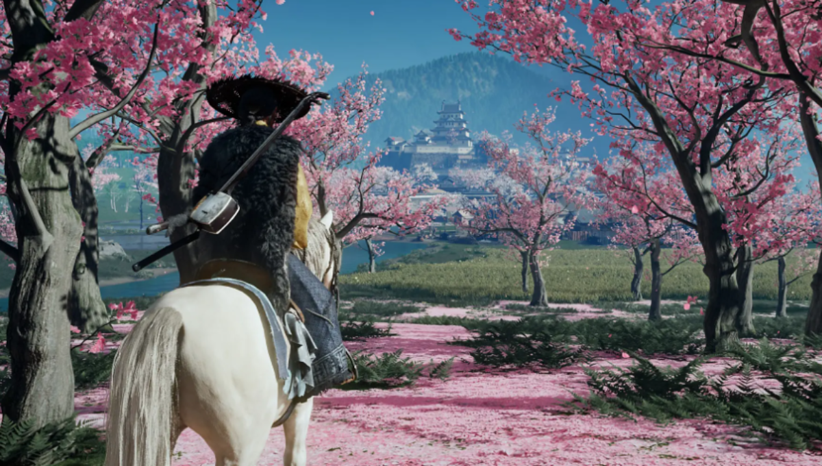 Ghost of Yōtei key art showing Atsu silhouetted against Mount Yōtei at dusk