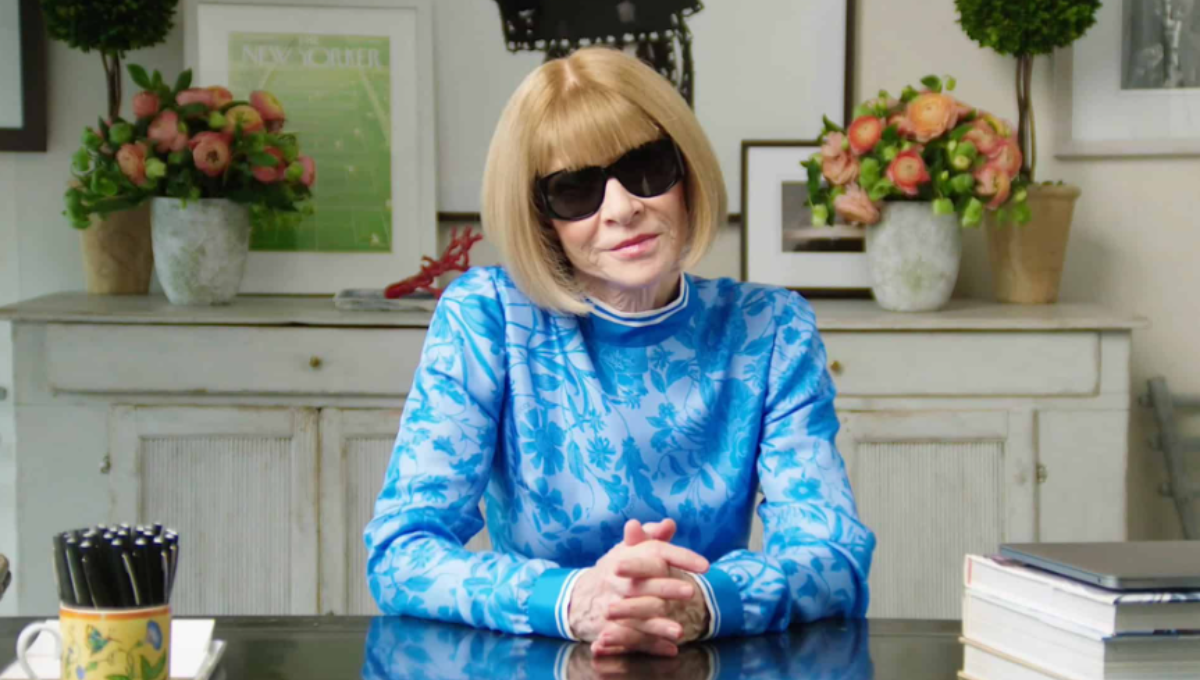 Anna Wintour on the Met Gala red carpet in a crystal-embellished gown with signature sunglasses