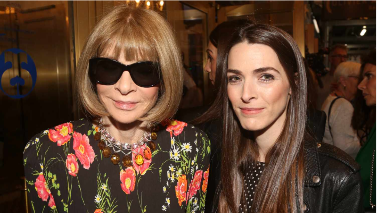 Anna Wintour on the Met Gala red carpet in a crystal-embellished gown with signature sunglasses