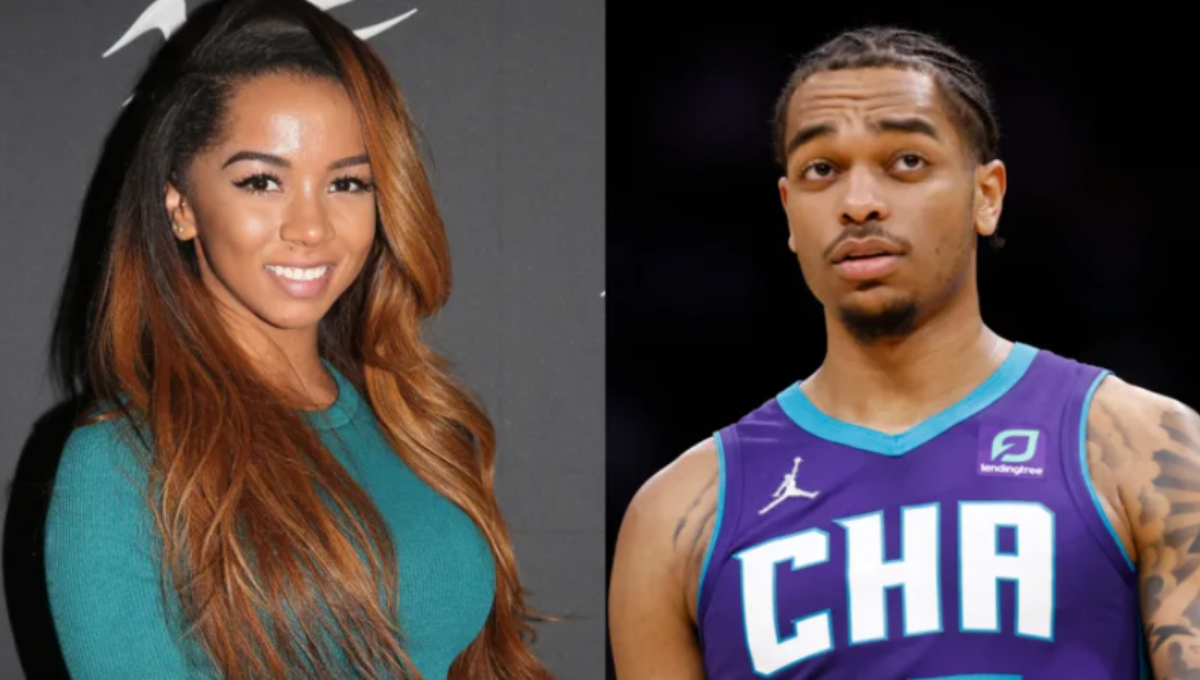 PJ Washington smiling alongside his wife Alisah Washington on a sunlit day in Dallas after an NBA game